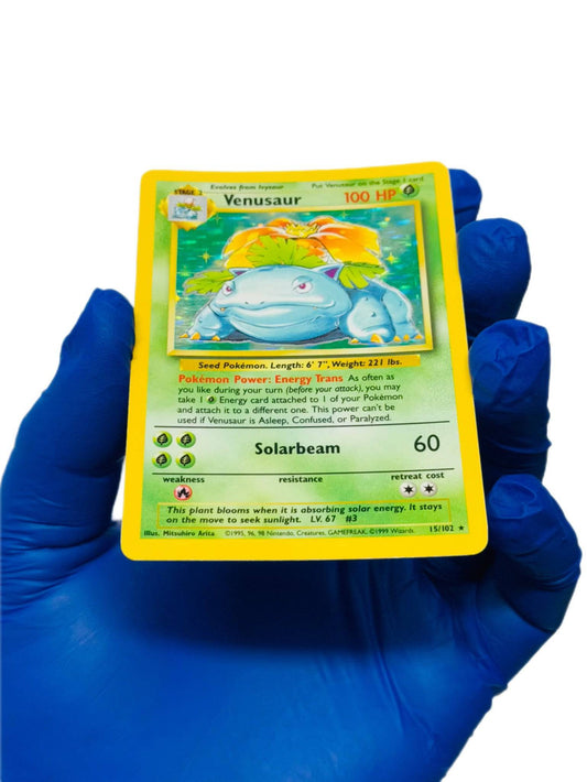 Venusaur Holo Pokémon card from the Base Set by BlueGloveTCG, featuring vibrant artwork and holographic details.