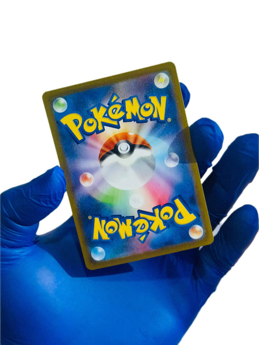 Fraxure single trading card from BlueGloveTCG, featuring detailed artwork of the dragon Pokémon on a vibrant background.