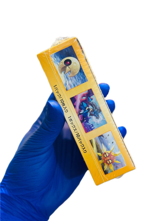 Sealed Pokémon Vstar Universe Booster Box by BlueGloveTCG featuring vibrant artwork and multiple booster packs inside.