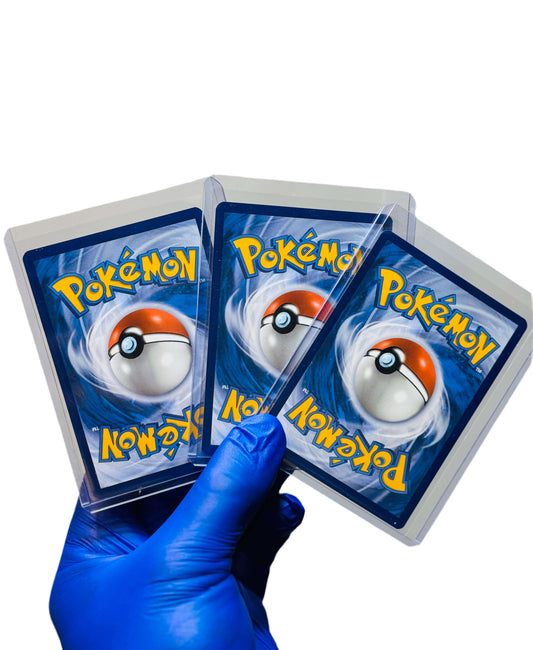 Shiny Quaxly, Quaxwell, and Quaquaval Pokémon cards from BlueGloveTCG bundle laid out on a white background.
