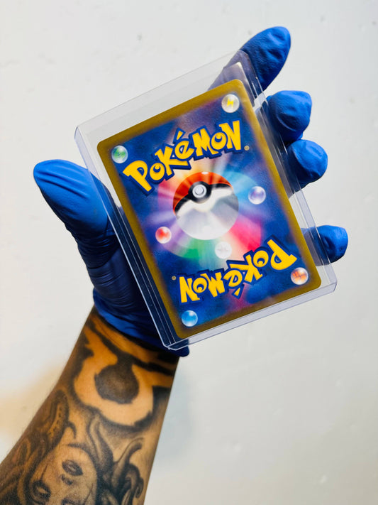 Japanese Pikachu Vmax Pokémon card by BlueGloveTCG featuring Pikachu in a dynamic Vmax pose on a vibrant background.