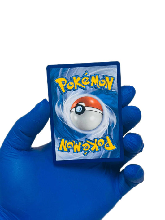 Venusaur & Snivy GX Tag Team single trading card from BlueGloveTCG, featuring vibrant Pokémon artwork and character details.