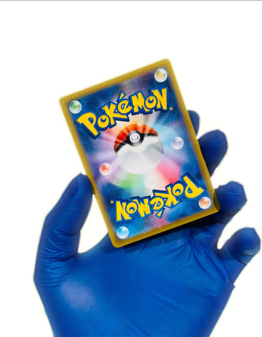 BlueGloveTCG Cynthia’s Garchomp EX single card featuring full art of Garchomp in dynamic pose on a vibrant Pokémon card background.