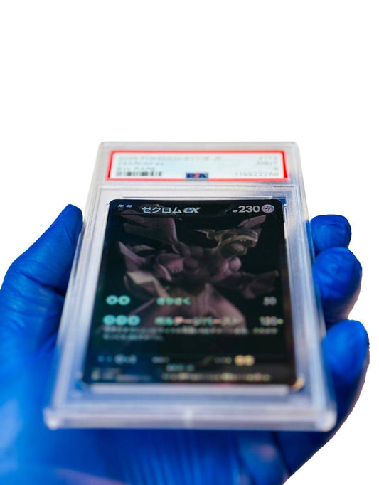 Zekrom Ex Pokémon card from BW Rare series, PSA 9 graded, featuring detailed artwork, blue border, and collectible trading card design.