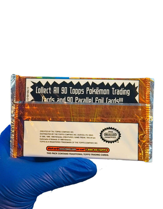 Sealed 1999 Pokemon Topps Series 1 booster pack by BlueGloveTCG, featuring colorful packaging and collectible cards inside