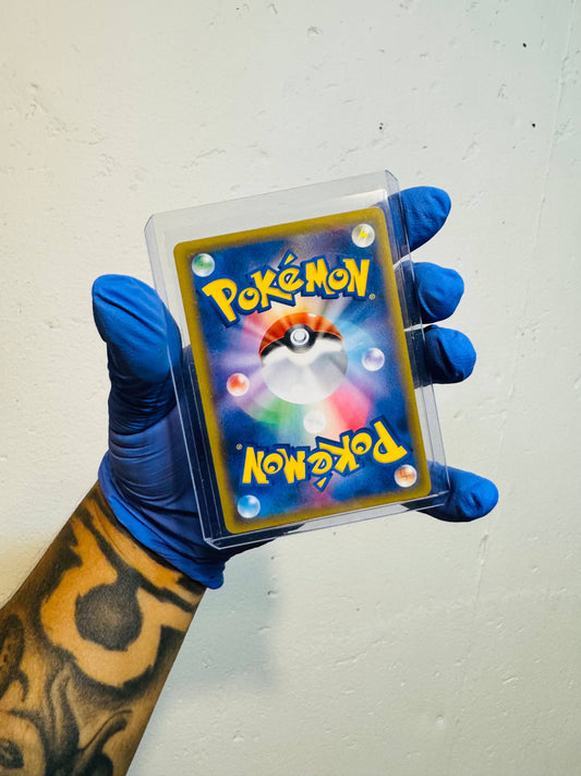 Shiny Eevee Pokémon trading card from BlueGloveTCG, featuring a detailed illustration of the popular electric-type Pokémon.